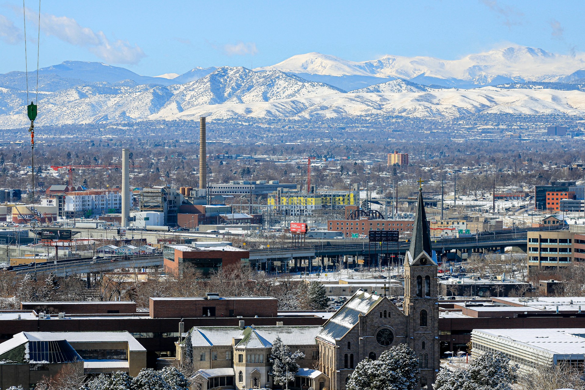 Mile High City. The Denver skyline looking towards the Rockies.